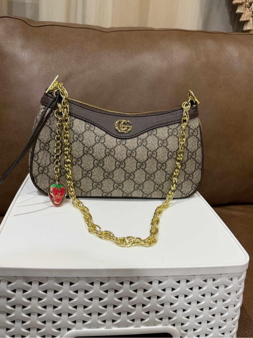 Gucci GG Supreme Canvas Shoulder Bag with Gold Chain and Strawberry Charm